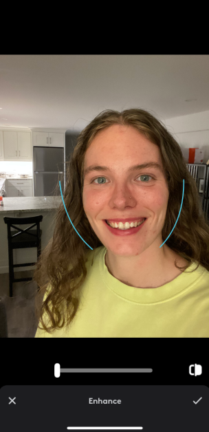 9-722397a4-fc22-4f4c-b19f-67d12a956713 Uploading a selfie and using the Enhance tool in Facetune.